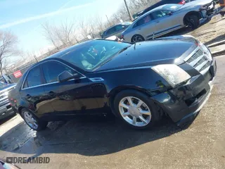 2009 Cadillac CTS AWD w/1SA with VIN 1G6DH577290166448, listed as a IAAI auction lot 41751610 with 158,378 mi miles. Bid and sale history available at carsss.com. Image 13.