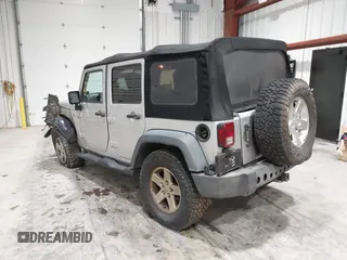 2008 Jeep Wrangler Unlimited X with VIN 1J4GA391X8L647311, listed as a IAAI auction lot 41499620 with 140,601 mi miles and . Bid and sale history available at carsss.com. Image 3.