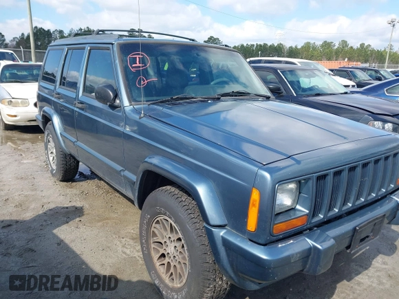 1998 Jeep Cherokee Sport with VIN 1J4FT68S0WL125382, listed as a IAAI auction lot 41551866 with 1 mi miles. Bid and sale history available at carsss.com. Image 1.
