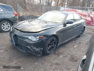 2017 Alfa Romeo Giulia Ti with VIN ZARFAEEN7H7561233, listed as a IAAI auction lot 41236823 with 51,062 mi miles. Bid and sale history available at carsss.com. Image 17.
