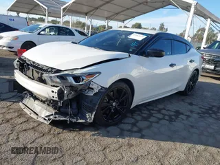 2017 Nissan Maxima SV with VIN 1N4AA6APXHC392355, listed as a IAAI auction lot 41153272 with 83,384 mi miles and . Bid and sale history available at DreamBid. Image 18.