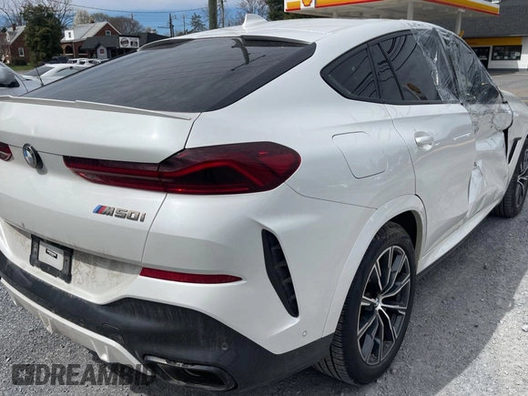 2023 BMW X6 M50i with VIN 5UXCY8C02P9N80310, listed as a Copart auction lot 50582585 with 19,686 mi miles and Clean Title. Bid and sale history available at carsss.com. Image 4.