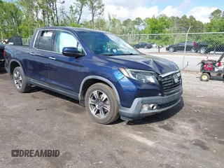 2019 Honda Ridgeline RTL-E with VIN 5FPYK3F76KB010613, listed as a IAAI auction lot 42079810 with 90,492 mi miles and . Bid and sale history available at DreamBid. Image 1.