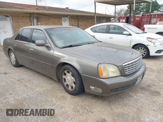 2002 Cadillac DeVille with VIN 1G6KD54Y52U183579, listed as a IAAI auction lot 41530038 with 141,186 mi miles. Bid and sale history available at carsss.com. Image 1.