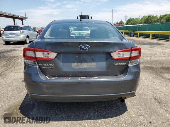 2019 Subaru Impreza z VIN 4S3GKAA65K3609930, wystawiony jako Copart lot #59319395 z przebiegiem 98 677 mil mil oraz Szkoda całkowita • Salvage title. Historia ofert i sprzedaży dostępna na DreamBid. Obrazek 6.