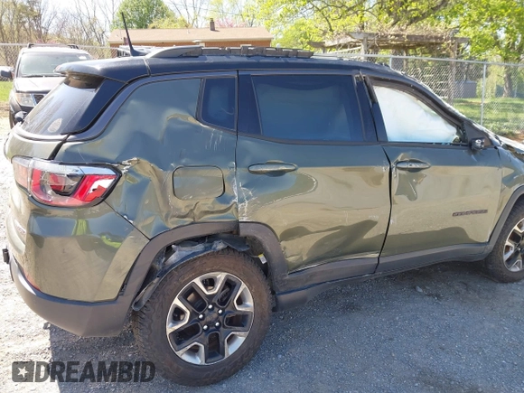 2018 Jeep Compass Trailhawk with VIN 3C4NJDDB0JT241163, listed as a IAAI auction lot 41986193 with 89,246 mi miles and . Bid and sale history available at DreamBid. Image 13.