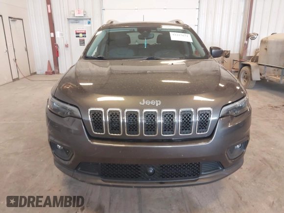 2021 Jeep Cherokee Latitude Lux z VIN 1C4PJMMX5MD194128, wystawiony jako IAAI lot #42257671 z przebiegiem 25 969 mil mil oraz . Historia ofert i sprzedaży dostępna na DreamBid. Obrazek 12.