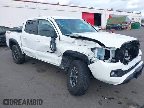 2023 Toyota Tacoma SR z VIN 3TMCZ5AN0PM541700, wystawiony jako IAAI lot #41819408 z przebiegiem 14 216 mil mil oraz . Historia ofert i sprzedaży dostępna na DreamBid. Obrazek 1.