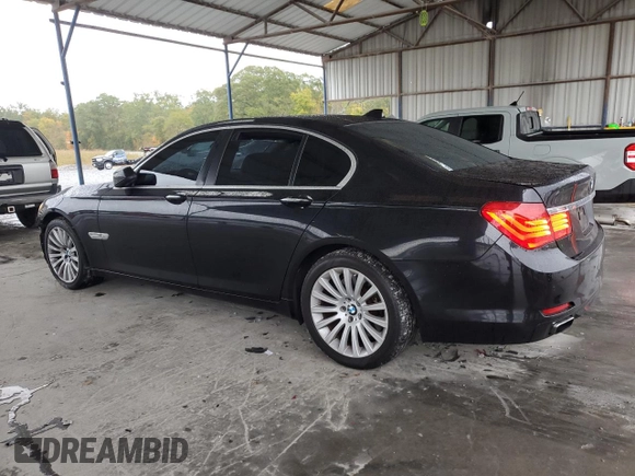 2011 BMW 7 Series 750i xDrive with VIN WBAKC6C56BC394810, listed as a Copart auction lot 79025014 with 152,399 mi miles and Salvage title. Bid and sale history available at DreamBid. Image 2.