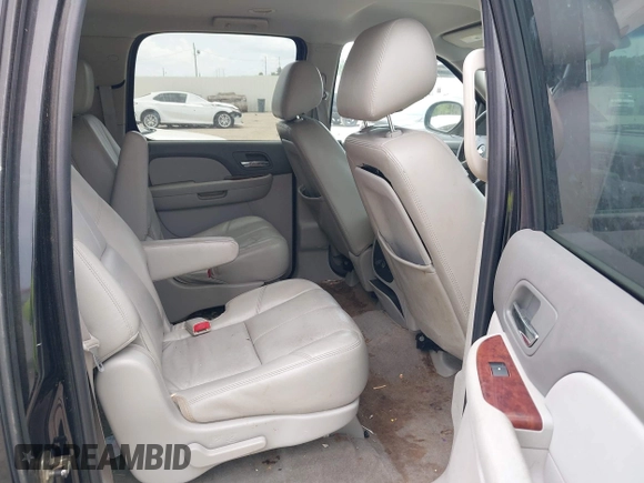 2011 Chevrolet Suburban LT with VIN 1GNSCJE07BR128885, listed as a IAAI auction lot 42456748 with 201,789 mi miles and . Bid and sale history available at DreamBid. Image 8.