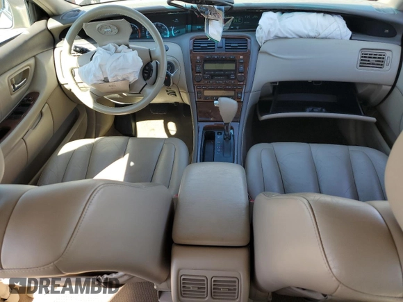 2002 Toyota Avalon XL z VIN 4T1BF28B72U200700, wystawiony jako Copart lot #50809455 z przebiegiem 151 328 mil mil oraz Szkoda całkowita • Salvage title. Historia ofert i sprzedaży dostępna na DreamBid. Obrazek 8.