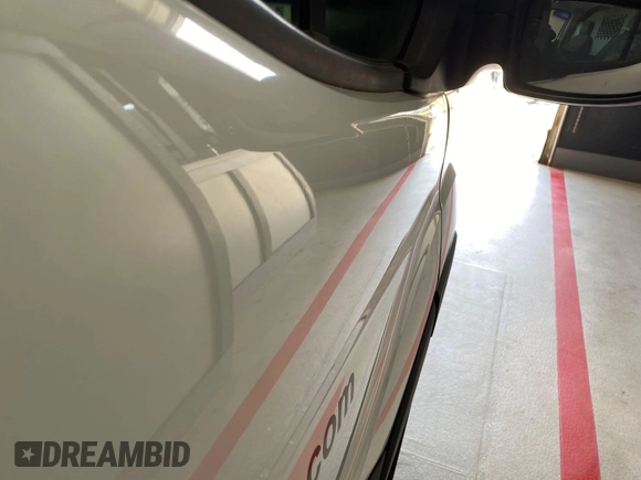 2020 Ford Transit Cargo with VIN 1FTBR1Y88LKB08471, listed as a IAAI auction lot 42297878 with 100,218 mi miles and . Bid and sale history available at DreamBid. Image 4.