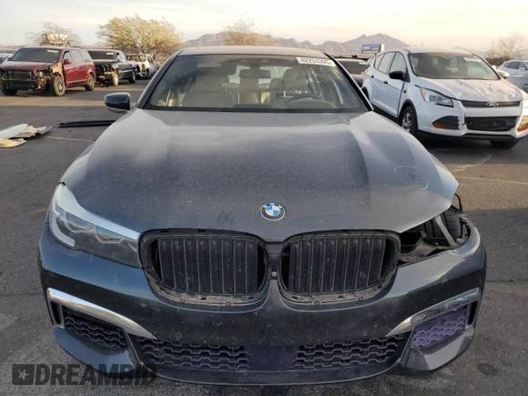 2016 BMW 7 Series 740i z VIN WBA7E2C53GG504611, wystawiony jako Copart lot #42253395 z przebiegiem 35 965 mil mil oraz Szkoda całkowita • Salvage title. Historia ofert i sprzedaży dostępna na DreamBid. Obrazek 5.