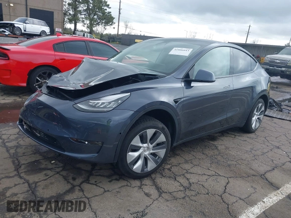 2022 Tesla Model Y Long Range with VIN 7SAYGDEE8NF317482, listed as a IAAI auction lot 41806043 with 32,108 mi miles and . Bid and sale history available at carsss.com. Image 20.