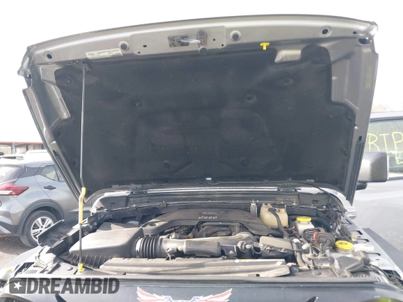 2020 Jeep Wrangler Unlimited Sport S with VIN 1C4HJXDG4LW221778, listed as a IAAI auction lot 41441662 with 76,026 mi miles and . Bid and sale history available at DreamBid. Image 10.