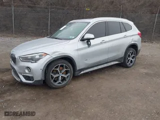 2017 BMW X1 xDrive28i with VIN WBXHT3Z38H4A64998, listed as a IAAI auction lot 41362963 with NaN miles. Bid and sale history available at carsss.com. Image 18.