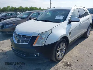 2011 Cadillac SRX Performance Collection with VIN 3GYFNBEYXBS540807, listed as a IAAI auction lot 42034047 with 198,429 mi miles. Bid and sale history available at carsss.com. Image 6.