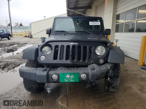 2014 Jeep Wrangler Unlimited Sport with VIN 1C4BJWDG2EL319714, listed as a Copart auction lot 47924575 with 129,294 mi miles and Salvage Title. Bid and sale history available at DreamBid. Image 5.