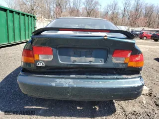 1997 Honda Civic EX with VIN 1HGEJ8142VL136575, listed as a Copart auction lot 49732395 with 296,782 mi miles and Salvage Title. Bid and sale history available at carsss.com. Image 6.