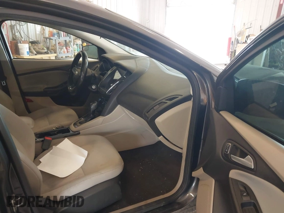 2015 Ford Focus SE with VIN 1FADP3F23FL216154, listed as a IAAI auction lot 42411857 with 127,612 mi miles and . Bid and sale history available at DreamBid. Image 5.