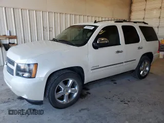 2013 Chevrolet Tahoe LTZ с VIN 1GNSCCE05DR167165, выставлен на аукционе Copart как лот 43565045 с пробегом 128 867 миль миль и Чистый • Clean title. История ставок и продаж доступна на DreamBid. Изображение 1.