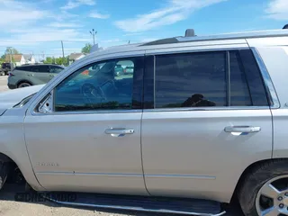 2016 Chevrolet Tahoe LTZ with VIN 1GNSKCKC1GR452600, listed as a IAAI auction lot 42305719 with 121,041 mi miles and . Bid and sale history available at DreamBid. Image 14.