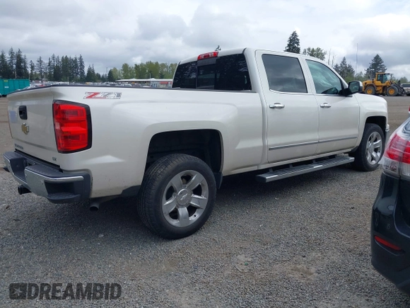 2015 Chevrolet Silverado 1500 LTZ with VIN 3GCUKSEC8FG156673, listed as a IAAI auction lot 42066694 with 70,163 mi miles and . Bid and sale history available at DreamBid. Image 4.