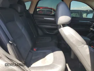 2018 Mazda CX-5 Touring z VIN JM3KFACM5J0338126, wystawiony jako Copart lot #56185795 z przebiegiem 115 254 mil mil oraz Szkoda całkowita • Salvage title. Historia ofert i sprzedaży dostępna na DreamBid. Obrazek 11.