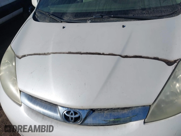 2006 Toyota Sienna XLE z VIN 5TDBA22C16S072064, wystawiony jako IAAI lot #41669738 z przebiegiem 201 678 mil mil oraz . Historia ofert i sprzedaży dostępna na DreamBid. Obrazek 6.