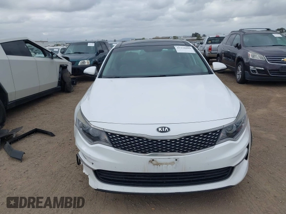 2016 Kia Optima EX with VIN 5XXGU4L31GG086203, listed as a IAAI auction lot 42128099 with 157,988 mi miles. Bid and sale history available at carsss.com. Image 12.