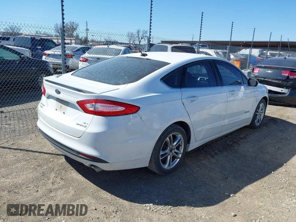 2016 Ford Fusion SE Hybrid with VIN 3FA6P0LU1GR127280, listed as a IAAI auction lot 41754682 with 194,357 mi miles. Bid and sale history available at carsss.com. Image 4.