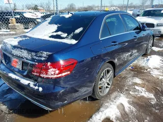 2014 Mercedes-Benz E 550 Sport with VIN WDDHF9BB5EA923294, listed as a IAAI auction lot 41588318 with 141,510 mi miles and . Bid and sale history available at DreamBid. Image 4.