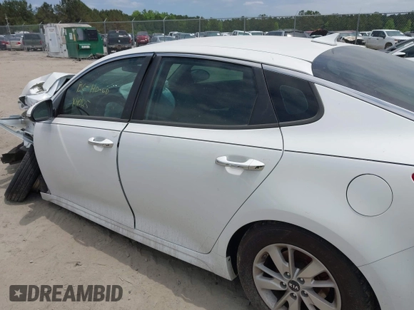 2018 Kia Optima S with VIN 5XXGT4L3XJG244516, listed as a IAAI auction lot 42136414 with 96,000 mi miles and . Bid and sale history available at DreamBid. Image 14.