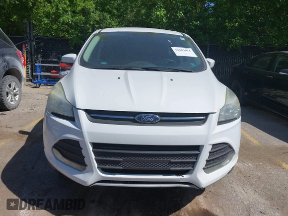 2016 Ford Escape SE z VIN 1FMCU9GX1GUC67851, wystawiony jako IAAI lot #42283011 z przebiegiem 134 458 mil mil oraz . Historia ofert i sprzedaży dostępna na DreamBid. Obrazek 12.