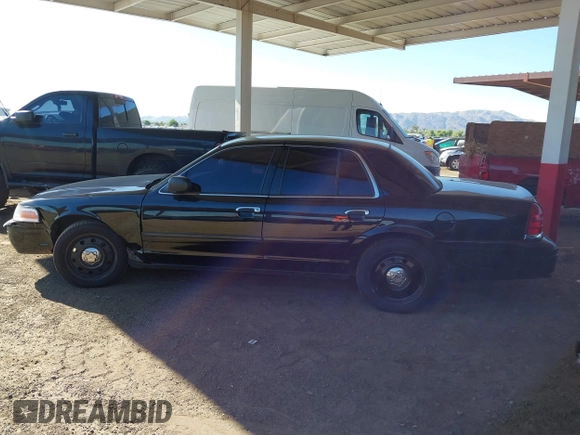 2007 Ford Police Interceptor with VIN 2FAFP71W27X115458, listed as a IAAI auction lot 42566334 with 213,435 mi miles and . Bid and sale history available at DreamBid. Image 14.