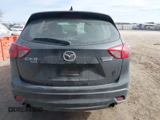 2016 Mazda CX-5 Sport with VIN JM3KE4BY0G0623365, listed as a IAAI auction lot 41525002 with 127,674 mi miles and . Bid and sale history available at carsss.com. Image 16.