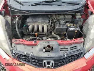 2013 Honda Fit Sport z VIN JHMGE8H69DC076469, wystawiony jako Copart lot #52234765 z przebiegiem 311 867 mil mil oraz Czysty tytuł • Clean title. Historia ofert i sprzedaży dostępna na DreamBid. Obrazek 11.