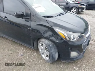 2020 Chevrolet Spark LS with VIN KL8CB6SA6LC407218, listed as a IAAI auction lot 39954901 with 77,256 mi miles and . Bid and sale history available at DreamBid. Image 6.