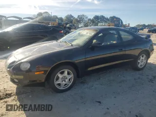 1997 Toyota Celica GT with VIN JT2DG02TXV0040610, listed as a Copart auction lot 79677454 with 179,749 mi miles and Salvage Title. Bid and sale history available at carsss.com. Image 1.