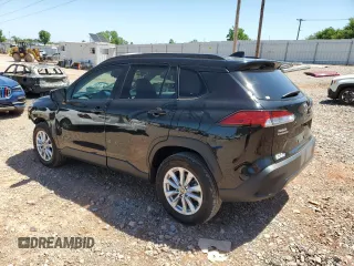 2023 Toyota Corolla Cross LE with VIN 7MUCAAAG3PV058094, listed as a Copart auction lot 57983105 with 30,593 mi miles and Salvage title. Bid and sale history available at DreamBid. Image 2.