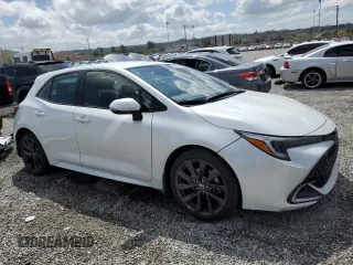 2023 Toyota Corolla Hatchback XSE with VIN JTNC4MBE4P3211451, listed as a Copart auction lot 50886045 with 16,344 mi miles and Salvage Title. Bid and sale history available at carsss.com. Image 4.