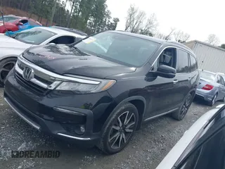 2019 Honda Pilot Touring 7-Passenger z VIN 5FNYF5H66KB027960, wystawiony jako IAAI lot #41863212 z przebiegiem 114 615 mil mil oraz . Historia ofert i sprzedaży dostępna na DreamBid. Obrazek 14.
