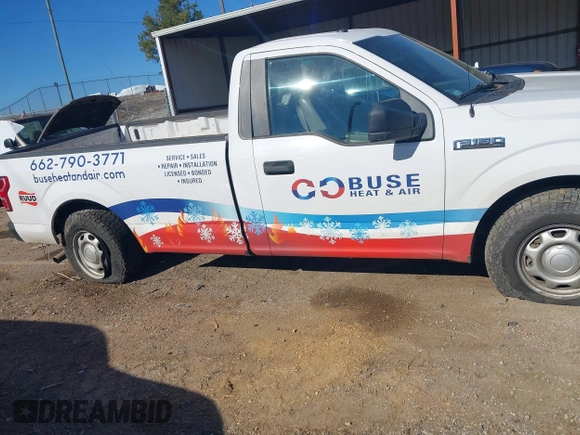 2018 Ford F-150 XL with VIN 1FTMF1C59JKF99158, listed as a IAAI auction lot 41356147 with 200,694 mi miles. Bid and sale history available at carsss.com. Image 17.