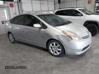 2007 Toyota Prius z VIN JTDKB20U073293764, wystawiony jako IAAI lot #42136679 z przebiegiem 266 101 mil mil oraz . Historia ofert i sprzedaży dostępna na DreamBid. Obrazek 1.