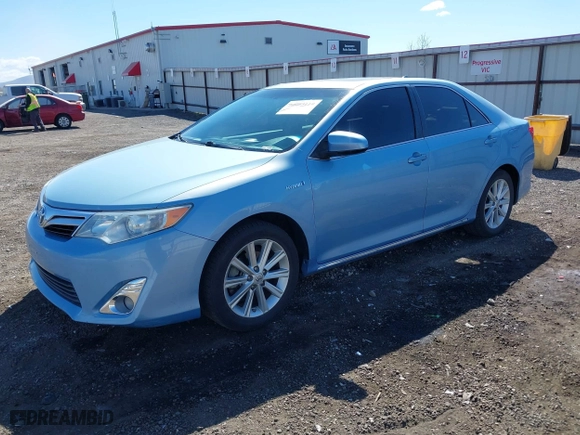 2014 Toyota Camry Hybrid LE with VIN 4T1BD1FK7EU098824, listed as a IAAI auction lot 42063119 with 112,759 mi miles. Bid and sale history available at carsss.com. Image 2.