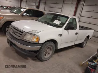 2000 Ford F-150 XL with VIN 1FTRF17W8YKB33949, listed as a IAAI auction lot 41519978 with 228,931 mi miles. Bid and sale history available at carsss.com. Image 2.