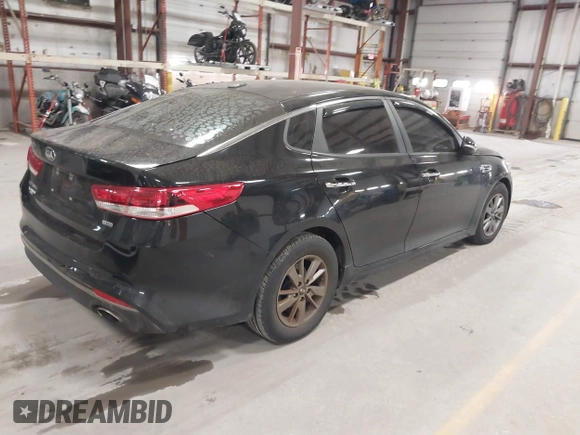 2016 Kia Optima LX Turbo with VIN 5XXGT4L16GG013751, listed as a IAAI auction lot 41843481 with 163,969 mi miles. Bid and sale history available at carsss.com. Image 4.
