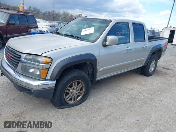 2009 GMC Canyon SLE1 z VIN 1GTDT13E398100890, wystawiony jako IAAI lot #42030572 z przebiegiem 160 181 mil mil oraz . Historia ofert i sprzedaży dostępna na DreamBid. Obrazek 2.