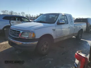 2002 Ford F-150 XL with VIN 1FTRX17L52NA26169, listed as a Copart auction lot 88756715 with 114,841 mi miles and Salvage title. Bid and sale history available at DreamBid. Image 1.