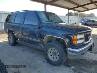1999 GMC Yukon with VIN 1GKEK13RXXJ730202, listed as a Copart auction lot 73236834 with 188,567 mi miles and Non Repairable. Bid and sale history available at carsss.com. Image 4.